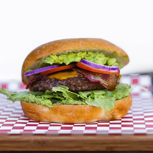 Black angus beef, American cheese, fresh avocado, applewood bacon, lettuce, tomato, red onion on a fresh kaiser roll.